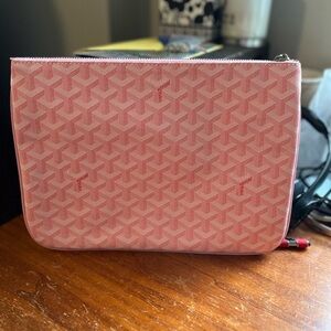 Elegant Pink Clutch with Signature Pattern